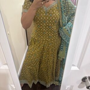 Heavily embroidered Olive and Teal Lehenga